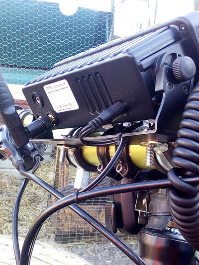 Inrico TM-7 network radio 'mountain bike mobile' secured to handlebars using 'pipe clamps' and Inrico TM-7 radio bracket.